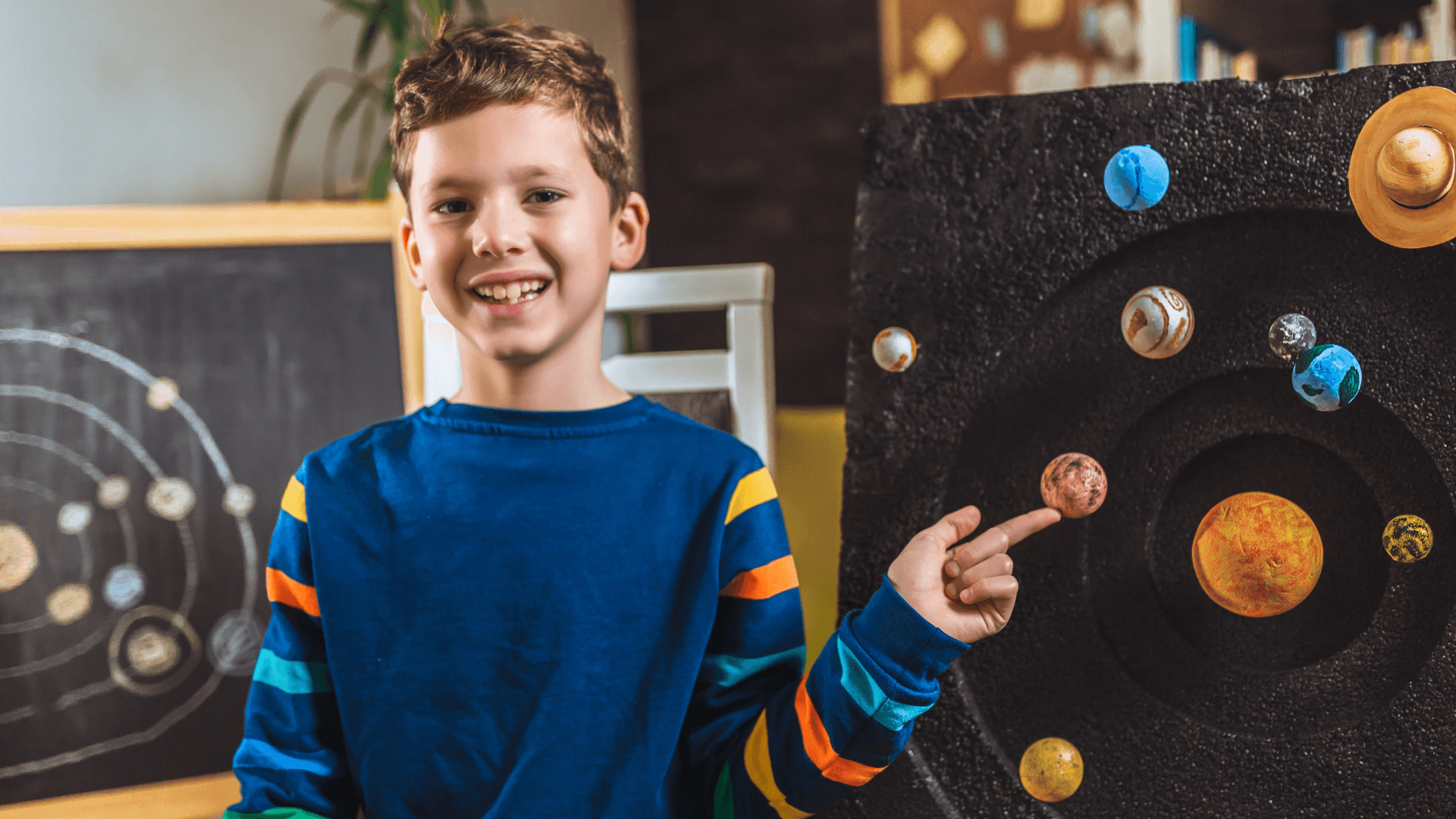 Child learning about the solar system